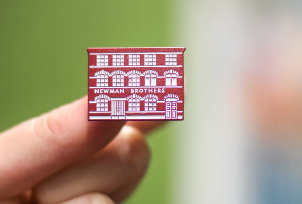 Newman Brothers Pin Badge